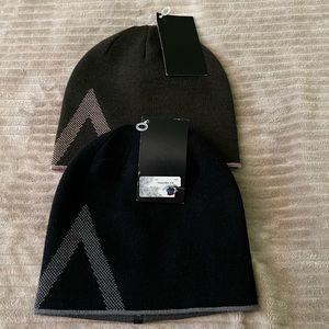 Two Arc’teryx beanies with tags